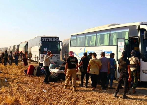 Saraya Ahl Al-Sham fighters’ repatriation in progress at the Lebanese Syrian border. (Social media)