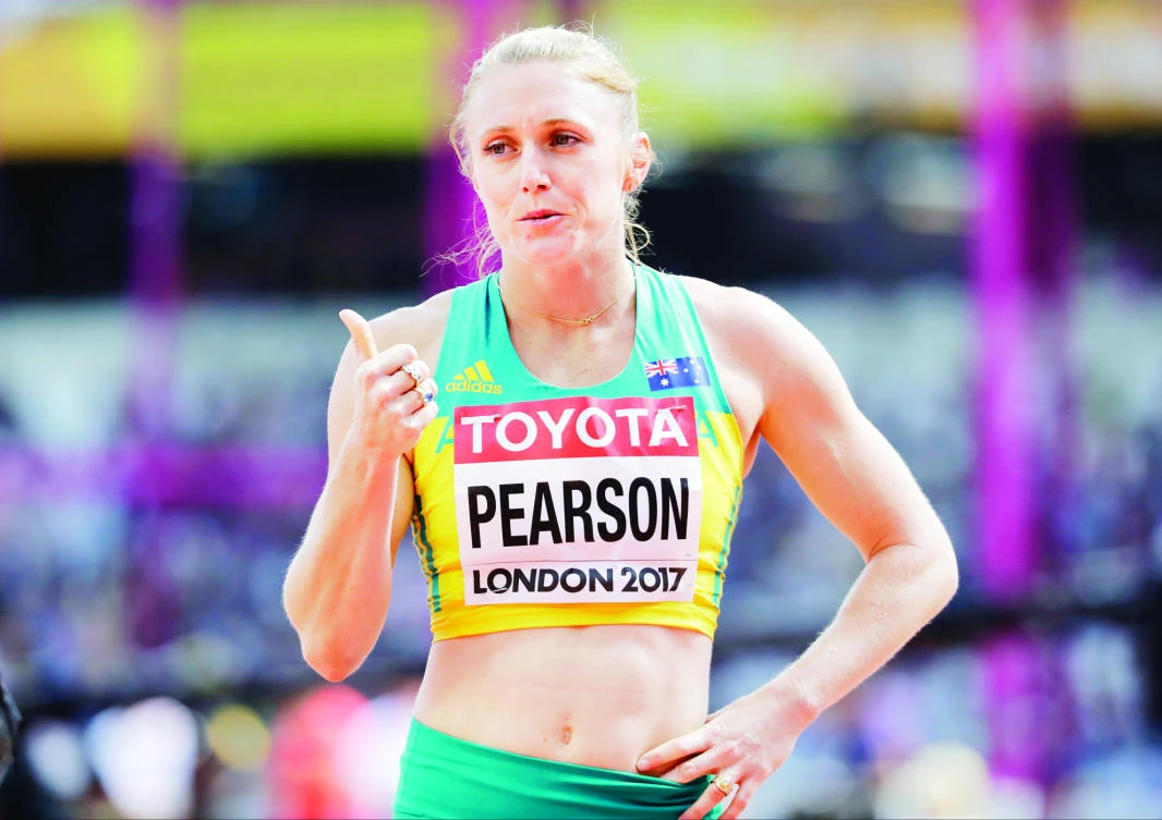 Australia’s Sally Pearson reacts after winning a Women’s 100-meter hurdles heat during the World Athletics Championships in London on Friday. (AP)