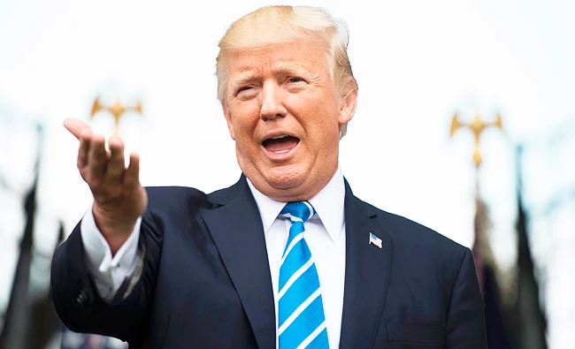 US President Donald Trump speaks to the press on Friday at Trump National Golf Club in Bedminster, New Jersey. (AFP)