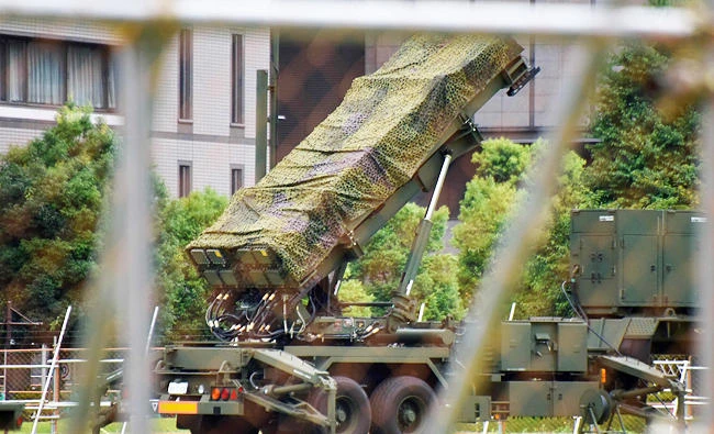 A Japanese Self-Defence Force Patriot Advanced Capability-3 (PAC-3) missile interceptor is deployed outside the Defence Ministry headquarters in Tokyo on Friday. (AFP)
