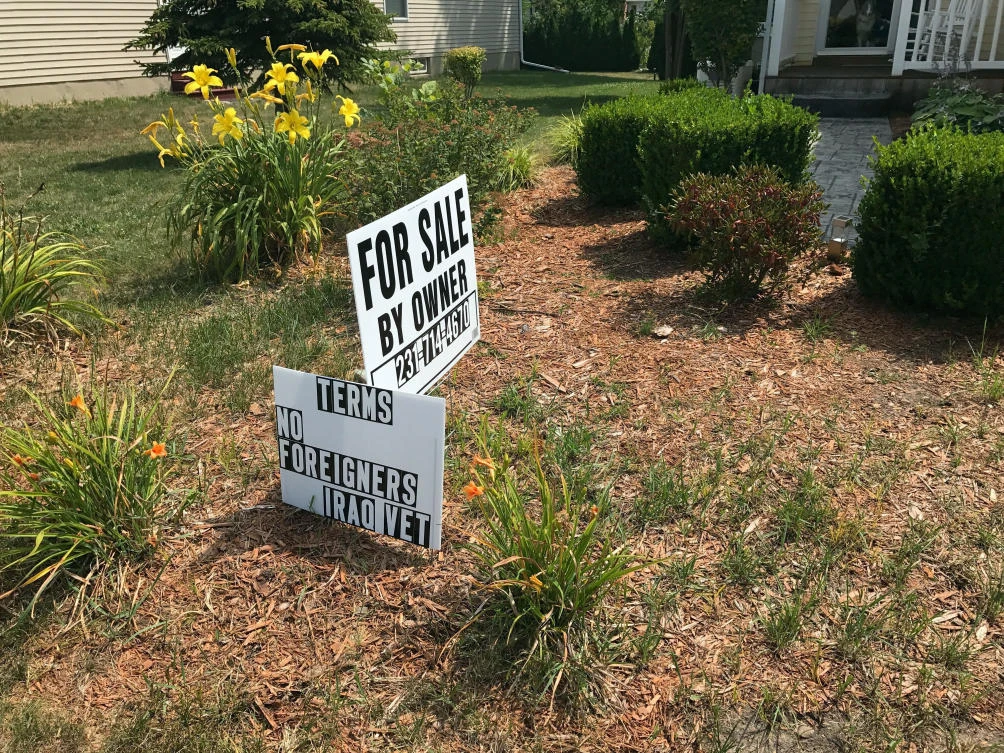 Michigan civil rights agency condemns ‘no foreigners’ sign