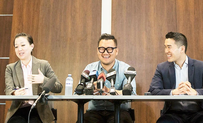 James Lim, center, the son of Rev. Hyeon Soo Lim, speaks to the media at the Light Presbyterian Church, in Mississauga, Ontario, Canada, on Saturday, after his father's return home from a North Korean prison. (AP)
