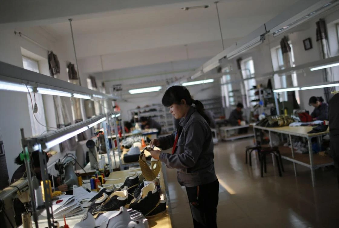 North Korean factories humming with ‘Made in China’ clothes