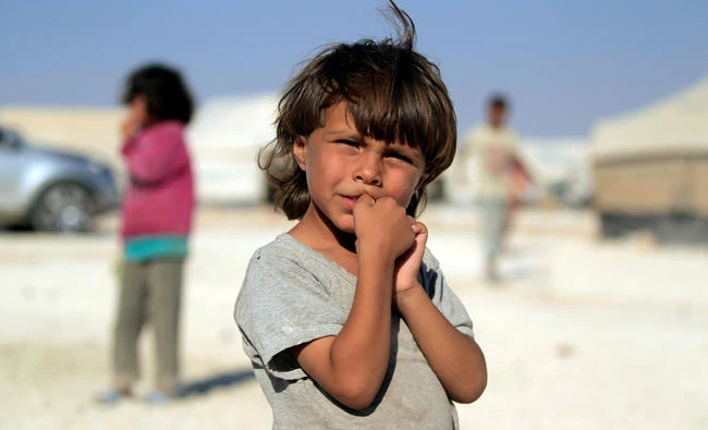 An internally displaced child is pictured at a camp in Ain Issa, north of Raqqa, Syria. (Reuters)