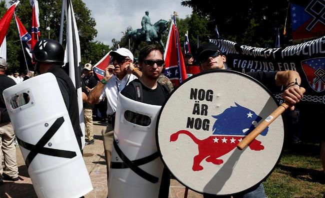 White supremacists stand behind their shields at a rally in Charlottesville, Virginia, US, on August 12, 2017. (REUTERS/Joshua Roberts)