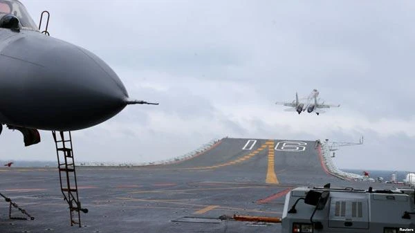 Chinese military aircraft conducted a third day of training near Taiwan on Monday after doing close flybys of the island over the weekend. (REUTERS)