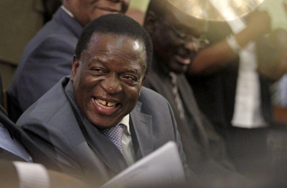 Zimbabwe Vice-President Emmerson Mnangagwa listens as President Robert Mugabe delivers his state of the nation address to the country's parliament in Harare, Zimbabwe August 25, 2015. (REUTERS file)
