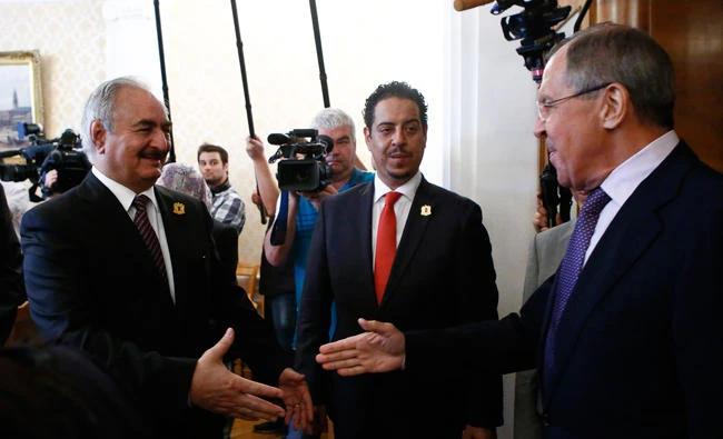 Russian Foreign Minister Sergei Lavrov, right, welcomes Gen. Khalifa Haftar, commander in the Libyan National Army (LNA), during a meeting in Moscow on Monday. (Reuters)