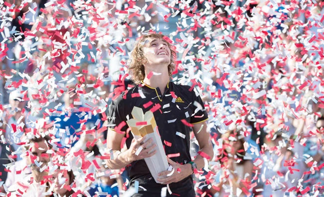 Confetti falls over Alexander Zverev, of Germany, during victory ceremonies after he defeated Roger Federer, of Switzerland, in the final at the Rogers Cup tennis tournament Sunday. (AP)