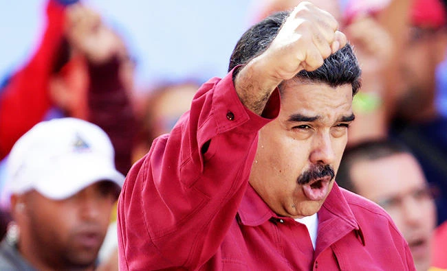 Venezuela's President Nicolas Maduro gestures during a rally against U.S President Donald Trump in Caracas, Venezuela, on Monday. (REUTERS)