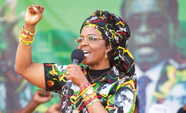 Zimbabwe’s first lady Grace Mugabe greets supporters at a rally in Zimbabwe in this July 29 file photo. (AP)