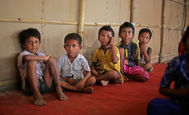 Children of Rohingya refugees attend a temporary school, run by a non-government organisation at a slum in New Delhi, India, Wednesday, Aug. 16, 2017. (AP)