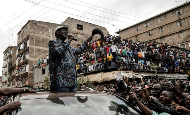 Kenyan opposition leader Raila Odinga addresses his supporters in the Mathare district of Nairobi. (AFP)