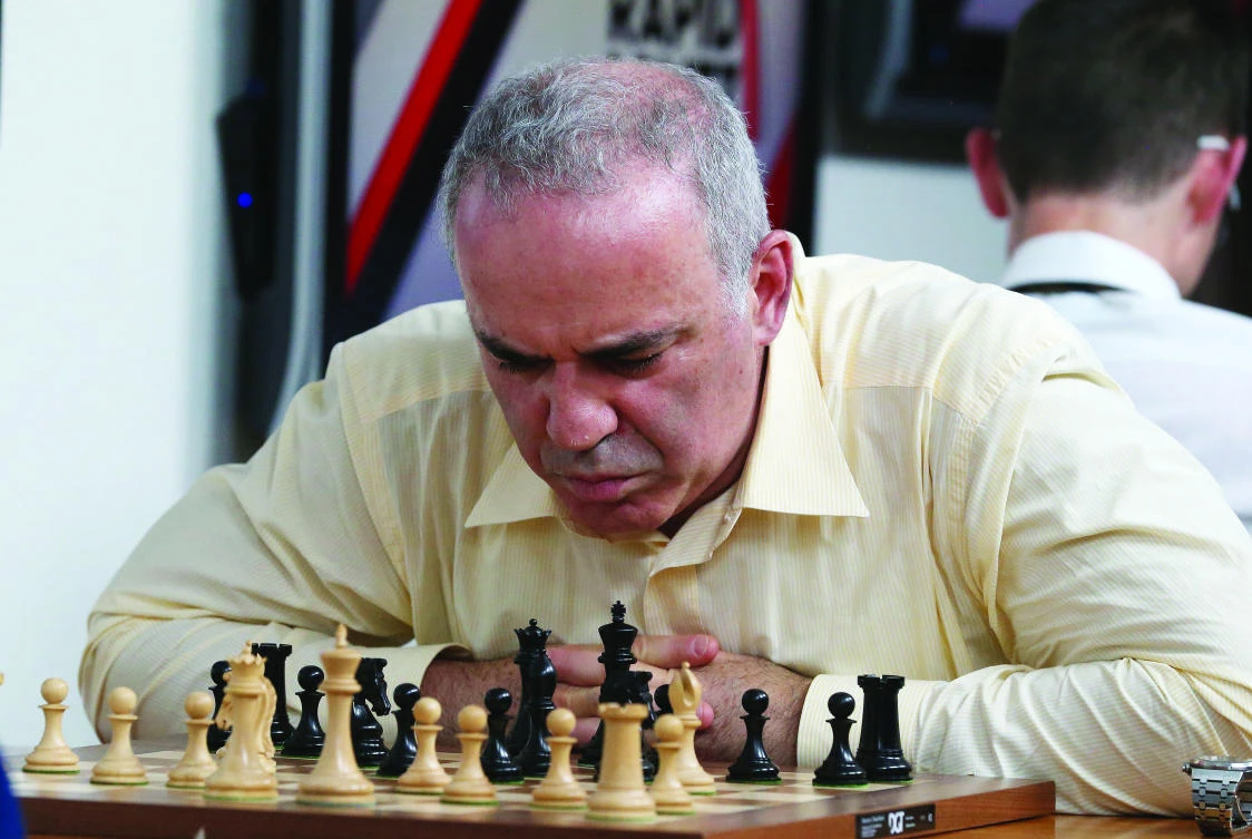 Grandmaster chess player Garry Kasparov concentrates on his next move during a match against grandmaster Levon Aronian in day two of the Grand Chess Tour at the Chess Club and Scholastic Center in St. Louis on Tuesday. (AFP)