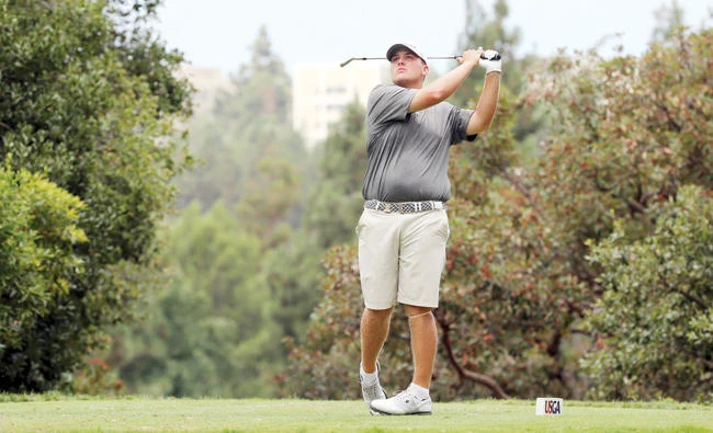 Braden Thornberry drives on the third tee in the second round of stroke play stage in the USGA US Amateur golf championship at Bel Air Country Club in Los Angeles. (AP)