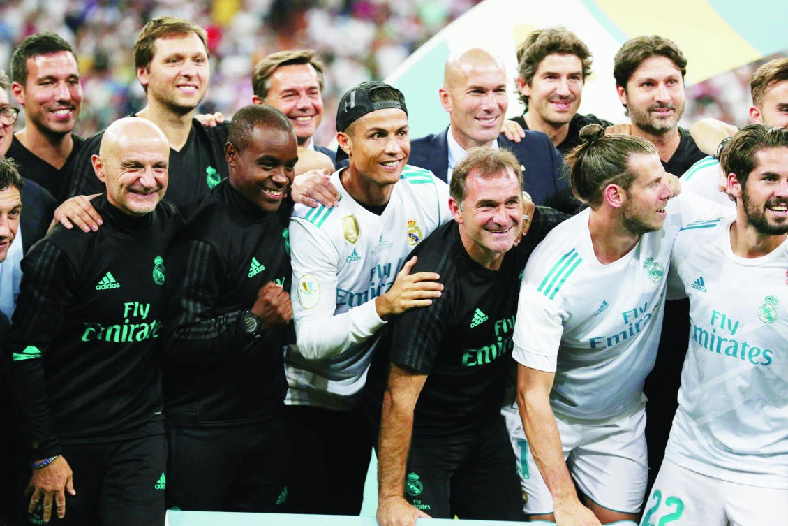 Real Madrid's Cristiano Ronaldo celebrates with teammates after winning the Spanish Super Cup. (Reuters)