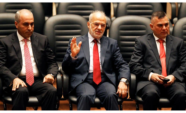 (L to R) Iraq Cabinet officials sit during a parliamentary session to vote on Iraq's new government at the parliament headquarters, in Baghdad, Iraq, in this file photo. (REUTERS/Thaier Al-Sudani/File Photo)