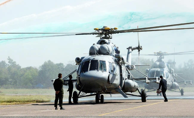 A water canon salute is given for two Mi-17 V5 Helicopters during the induction ceremony into the Border Security Force (BSF) in New Delhi, in this file photo. (AFP)
