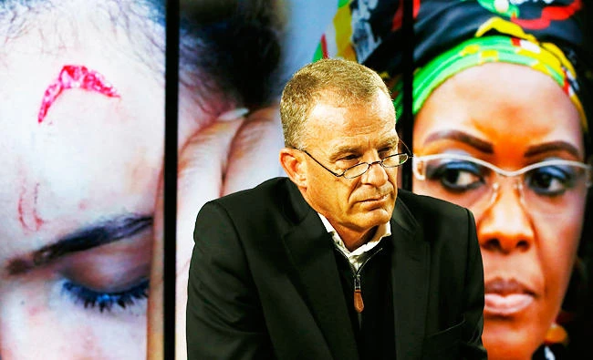 Head of the Private Prosecuting Unit of the civil rights organization AfriForum, Advocate Gerrie Nel looks on during a press conference concerning the alleged assault by Zimbabwe First Lady Grace Mugabe towards South African model Gabriella Engels on Thursday in Centurion. (AFP)