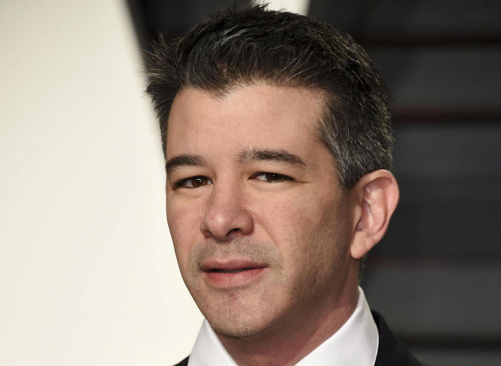 FILE - In this Feb. 26, 2017, file photo, Uber CEO Travis Kalanick arrives at the Vanity Fair Oscar Party in Beverly Hills, Calif. Ryan Graves, Uber's chief of global operations, resigned and investors sued the company’s former CEO. Graves told Uber staff in an email Thursday, Aug. 10, that he will transition out of his role as senior vice president of global operations in mid-September. That board, and its support for former CEO Travis Kalanick, was the subject of a lawsuit filed Thursday in Delaware Chancery Court by Benchmark Capital Partners. (Photo by Evan Agostini/Invision/AP, File)
