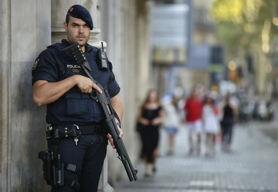 An armed police officer stands on a street in Las Ramblas, Barcelona, Spain, Friday, Aug. 18, 2017. (AP)