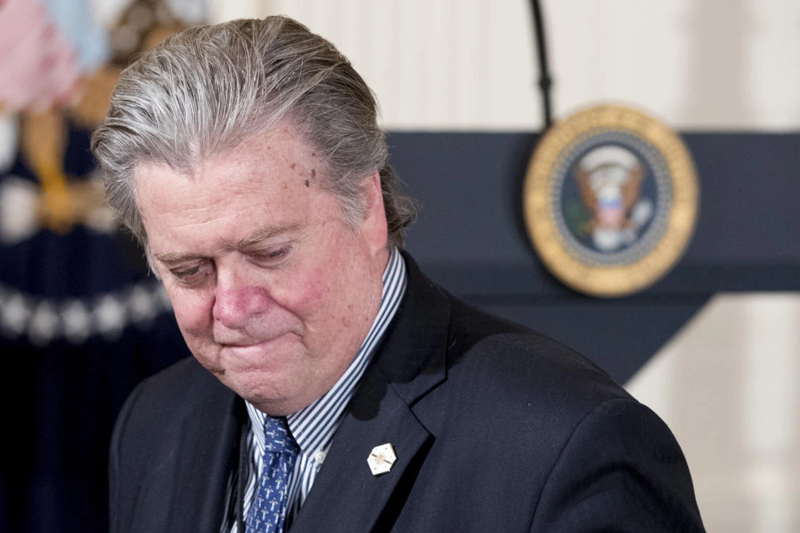 In this photo taken Feb. 16, 2017, President Donald Trump's White House Senior Adviser Steve Bannon arrives for a news conference with President Donald Trump in the East Room of the White House in Washington. Bannon, a forceful but divisive presence in President Donald Trump's White House, is leaving. Trump accepted Bannon's resignation Friday, Aug. 18, 2017, ending a turbulent seven months for his chief strategist, the latest to depart from the president's administration in turmoil. (AP Photo/Andrew Harnik)