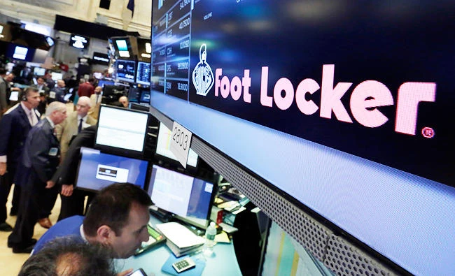 In this June 21, 2017 photo, the Foot Locker logo appears above a trading post on the floor of the New York Stock Exchange. (AP)