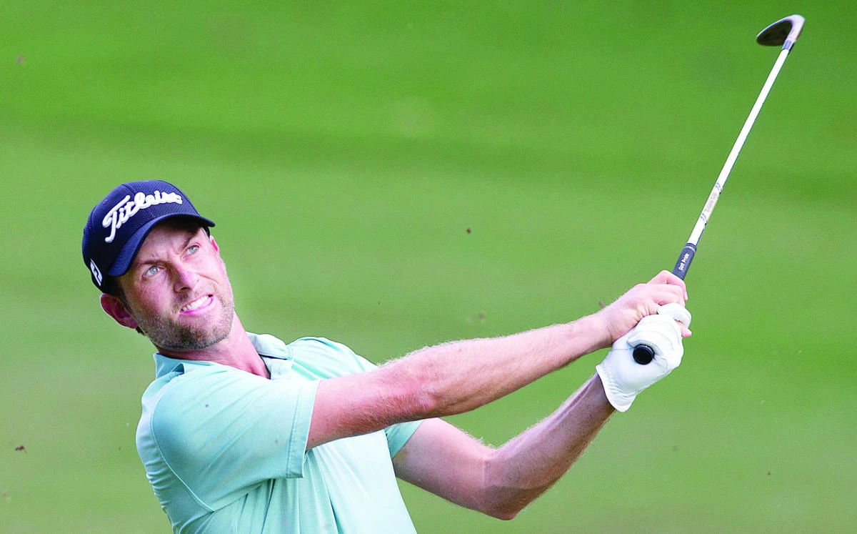 Webb Simpson watches a shot to the 18th green during the second round of the Wyndham Championship golf tournament Friday at Sedgefield Country Club in Greensboro, N.C. (AP)