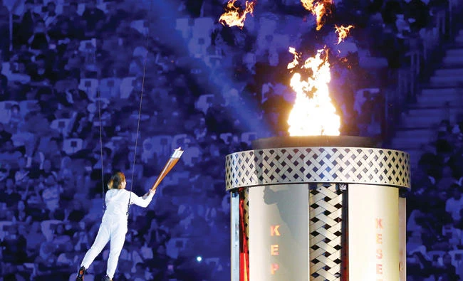 The SEA Games torch is lit during the glittering opening ceremony. (Reuters)