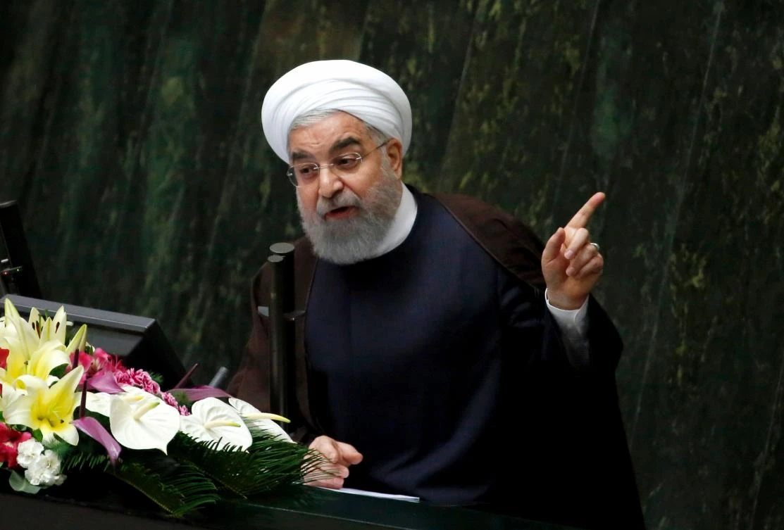 Iranian President Hassan Rouhani addresses a parliamentary session in Tehran on August 15, 2017. Rouhani warned that Iran could abandon its 2015 nuclear deal with world powers within hours if the United States keeps on imposing new sanctions as he outlined plans for his new term. (AFP)