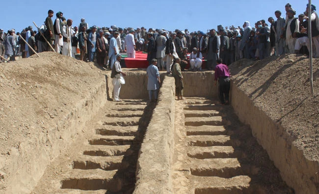 Graves are prepared for the burial of civilians, who were killed by insurgents at Mirza Olang village, in Sar-e Pul province, Afghanistan, on August 16, 2017. (REUTERS)