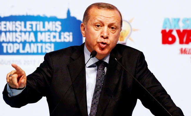 Turkish President Tayyip Erdogan speaks during a meeting of his ruling AK Party (AKP) in Istanbul, Turkey, on Sunday. (REUTERS)