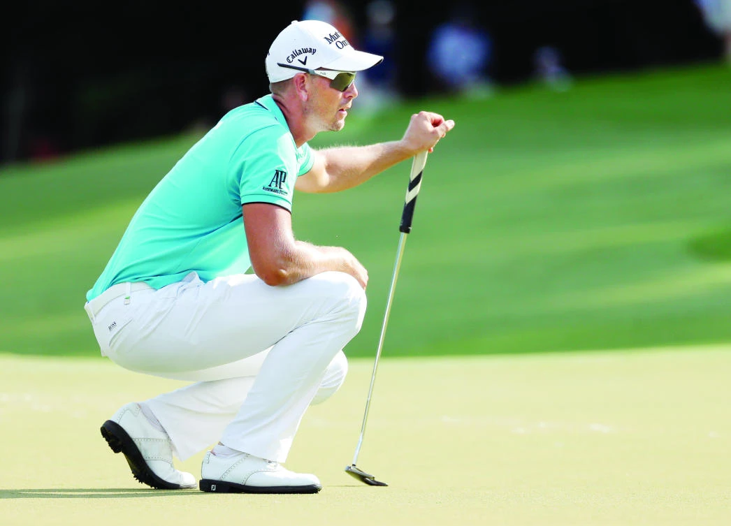 Henrik Stenson lines up a putt on the 15th hole on the hole during the third round of the Wyndham Championship golf tournament in Greensboro, N.C., Saturday. (AP)