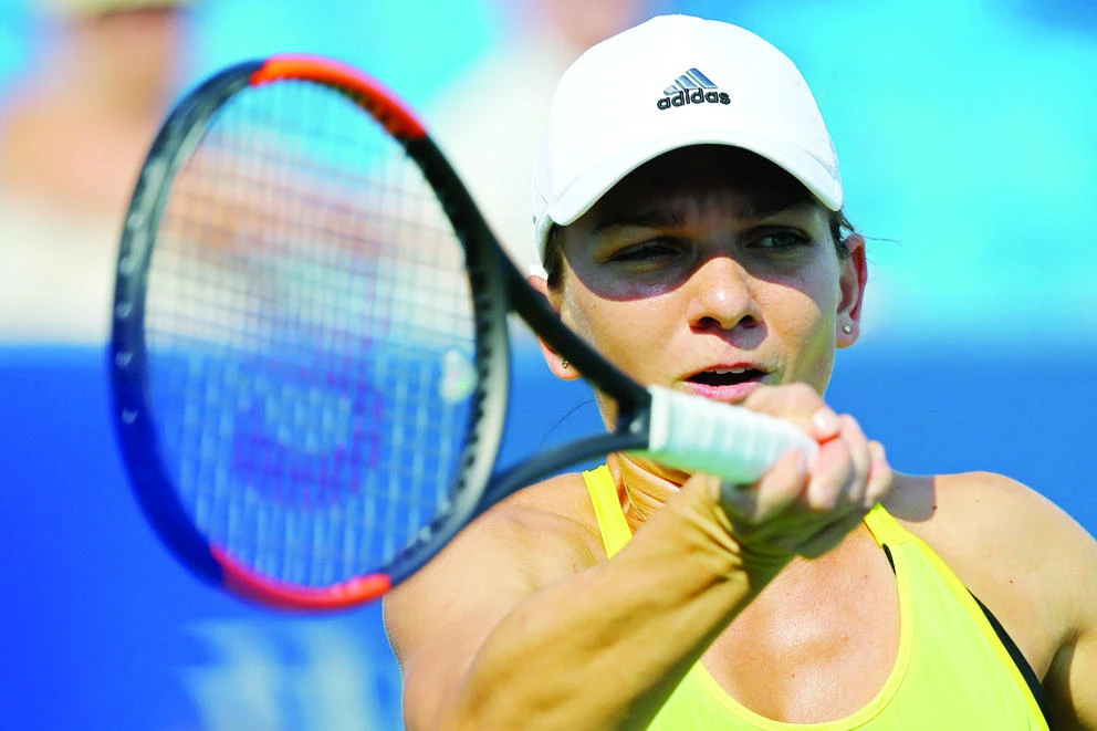 Simona Halep of Romania returns a shot against Sloane Stephens of the US during their semifinal match Saturday in the Western and Southern Open. (USA TODAY Sports)