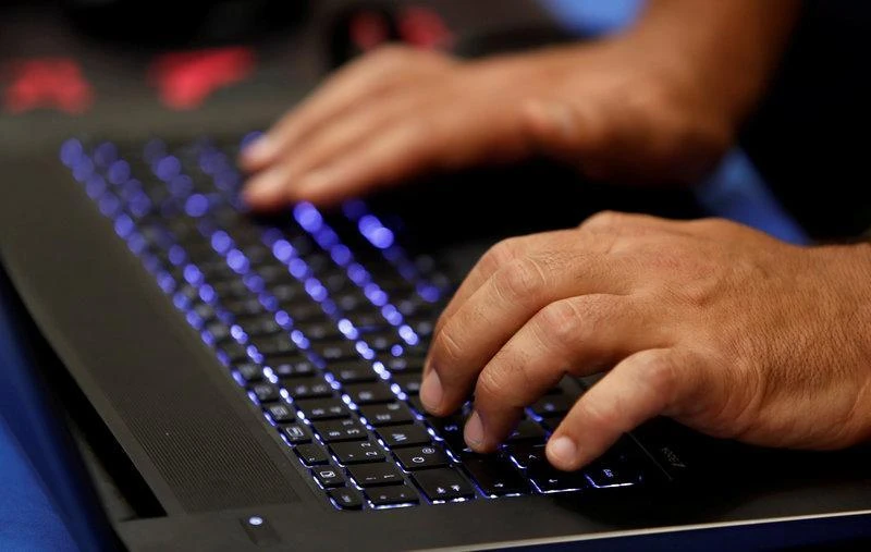 A man types into a keyboard during the Def Con hacker convention in Las Vegas, Nevada, US, on July 29, 2017. (File Photo by Reuters)