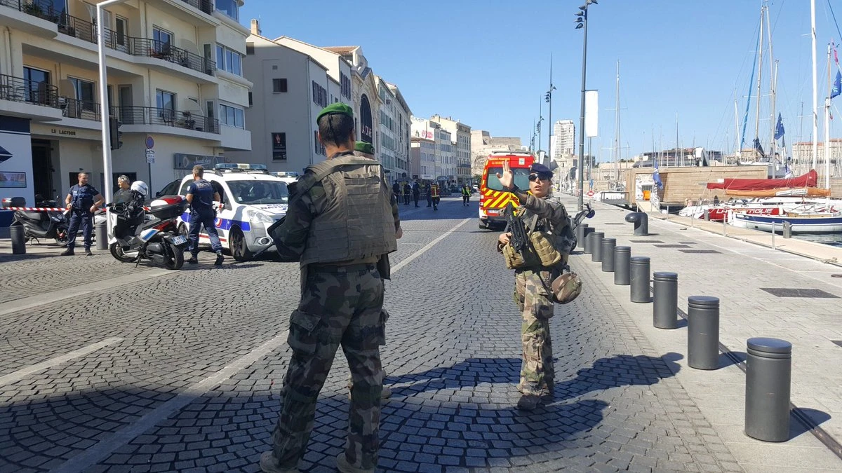 French army on scene where a car rammed into two buses. (photo courtesy: social media)