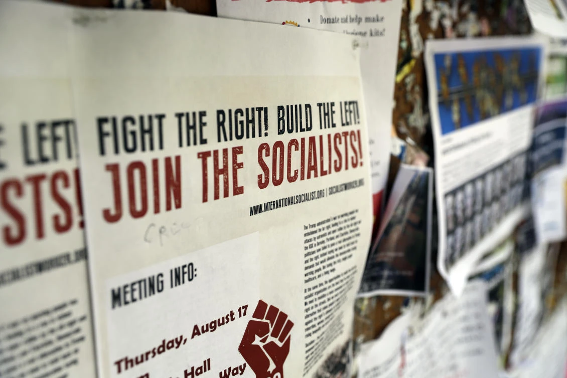 Signs are posted on a bulletin board on the UC Berkeley campus Tuesday, Aug. 15, 2017, in Berkeley, Calif. UC Berkeley Chancellor Carol Christ says the university is committed to protecting free speech, and is allowing former Breibart editor Ben Shapiro to visit and speak on campus, despite concerns about violent protests. (AP Photo/Marcio Jose Sanchez)