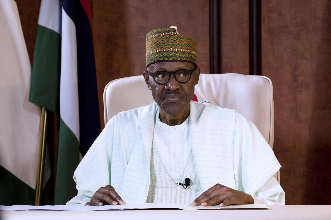 In this photo released by the Nigeria State House, Nigeria's President Muhammadu Buhari looks on during a broadcast to the Nation at the Presidential palace in Abuja, Nigeria, Monday, Aug. 21, 2017. Nigeria's President Muhammadu Buhari said his government will reinvigorate its campaign against the Islamic extremist insurgency in the country's northeast as he spoke to the nation for the first time Monday after returning from London where he spent more than three months for medical treatment. (Bayo Omoboriowo/Nigeria State House via AP)