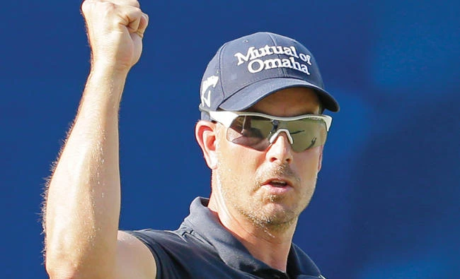 Henrik Stenson, of Sweden, reacts to making a birdie putt on the 17th hole during the final round of the Wyndham Championship golf tournament in Greensboro, N.C., Sunday. Stenson won the tournament. (AP)