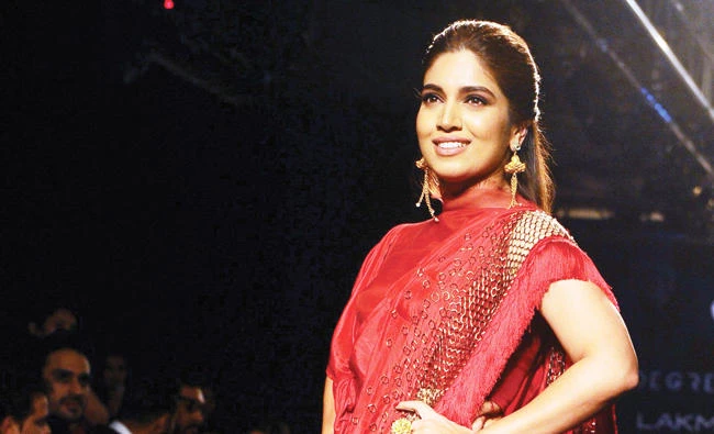 Bhumi Pednekar showcases a creation by designer Ruceru. (AFP)
