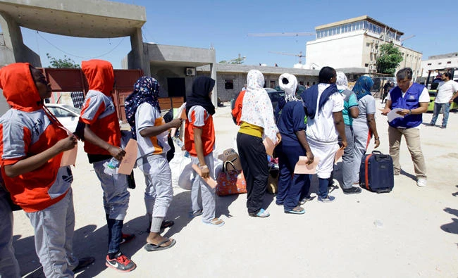 Migrants are seen at a processing center of the Anti-Illegal Immigration Authority in Tripoli, on Aug. 17. (Reuters)