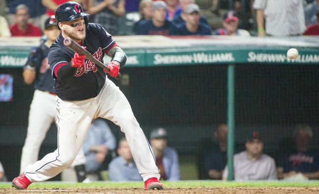 Cleveland Indians’ Roberto Perez prepares to bunt a pitch from Boston Red Sox relief pitcher Brandon Workman during the ninth inning of a baseball game in Cleveland Monday. The bunt allowed teammate Brandon Guyer to score the winning run from second base after a throwing error by Red Sox’s Brock Holt. The Indians won 5-4. (AP)