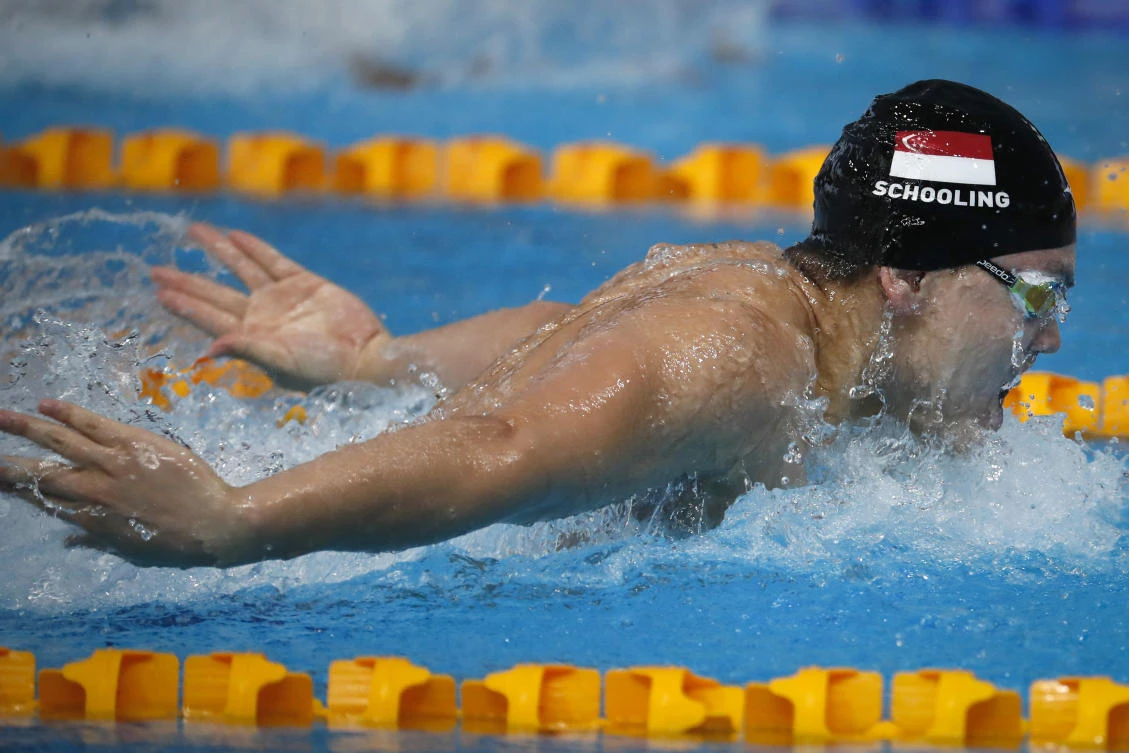 Singapore's Joseph Schooling compete during the men's 100m butterfly stroke swimming final of the 29th South East Asian Games in Kuala Lumpur Wednesday. (AP)