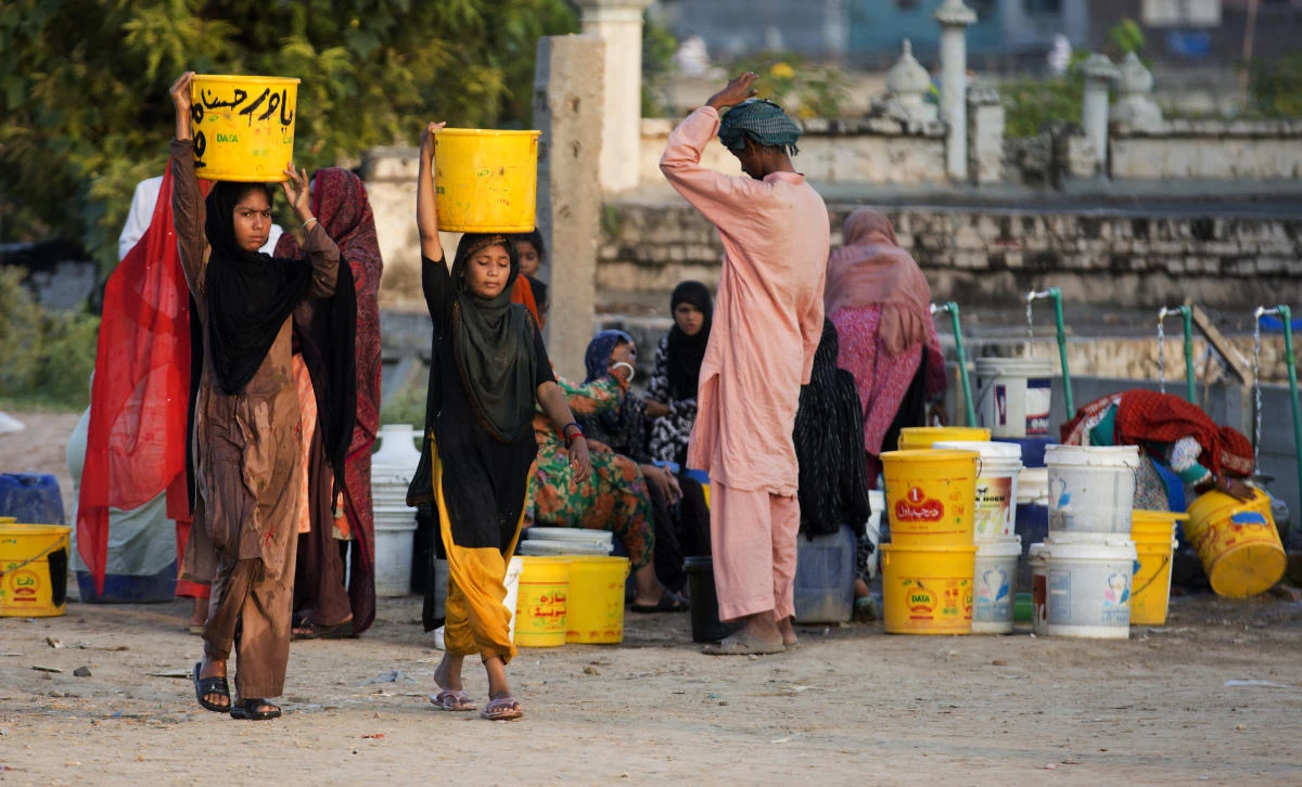 In this Tuesday, Aug. 22, 2017 photo, people collect water for their families from a tube well, in Islamabad, Pakistan, Wednesday, Aug. 23, 2017. A new study suggests some 50 million Pakistanis could be at risk of drinking arsenic-tainted groundwater. The findings are based on a hazard map built using water quality data from 1,200 tube wells in the densely populated Indus Valley. (AP)