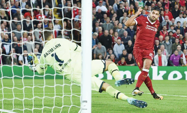 Liverpool's German midfielder Emre Can scores Liverpool's third goal during the Champions League qualifier second leg match between Liverpool and Hoffenheim on Wednesday night. (AFP)
