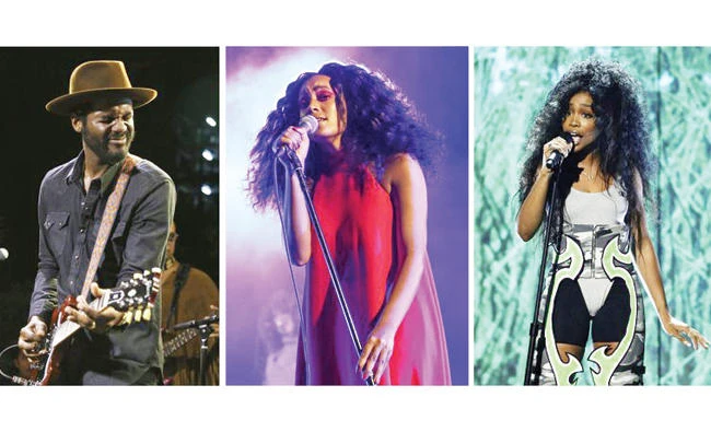Performers, from left, Gary Clark, Jr. at the South by Southwest Music Festival in Austin, Texas on Mar 17, Solange Knowles during the FYF Fest in Los Angeles on Aug. 23, 2015, and SZA at the BET Awards in Los Angeles on June 25. They will be perform at the Afropunk festival in Brooklyn’s Commodore Barry Park this weekend. (AP)