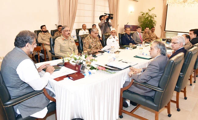 Prime Minister Shahid Khaqan Abbasi, left, heads a meeting of the National Security Committee in Islamabad, Pakistan, Thursday. (AP)