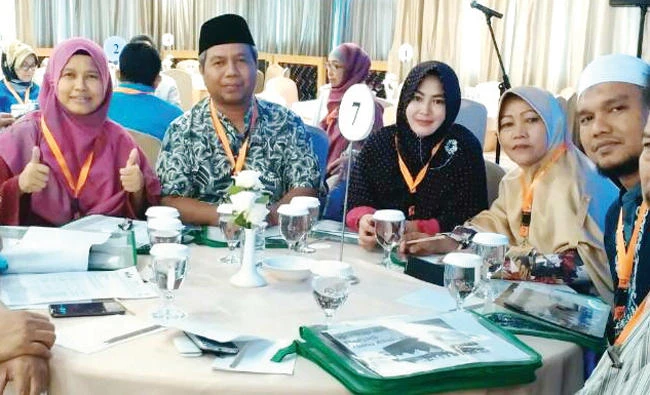 Taufan Erikson Sjukri, second left, also found a blessing in the disguise of his delayed departure in 2015. Along with his siblings and sister-in-law, he registered to go on Hajj in 2012.