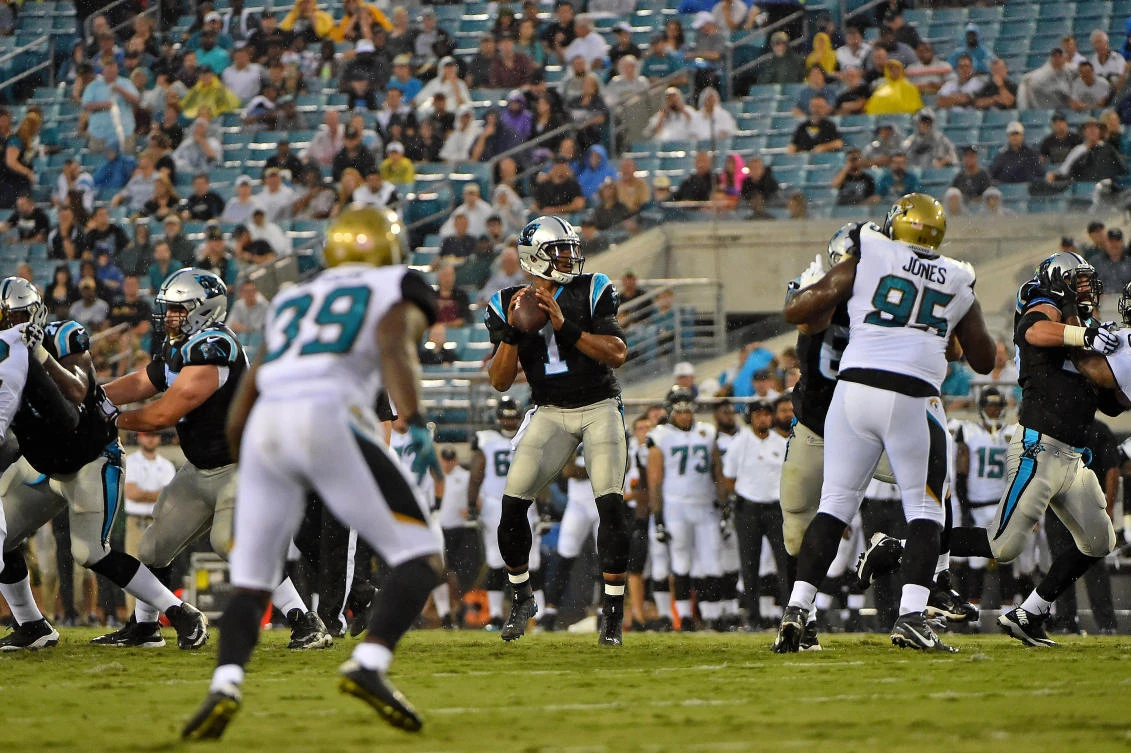 Carolina Panthers quarterback Cam Newton (1) attempts a pass against the Jacksonville Jaguars during the first half at EverBank Field. (Jasen Vinlove-USA TODAY Sports)