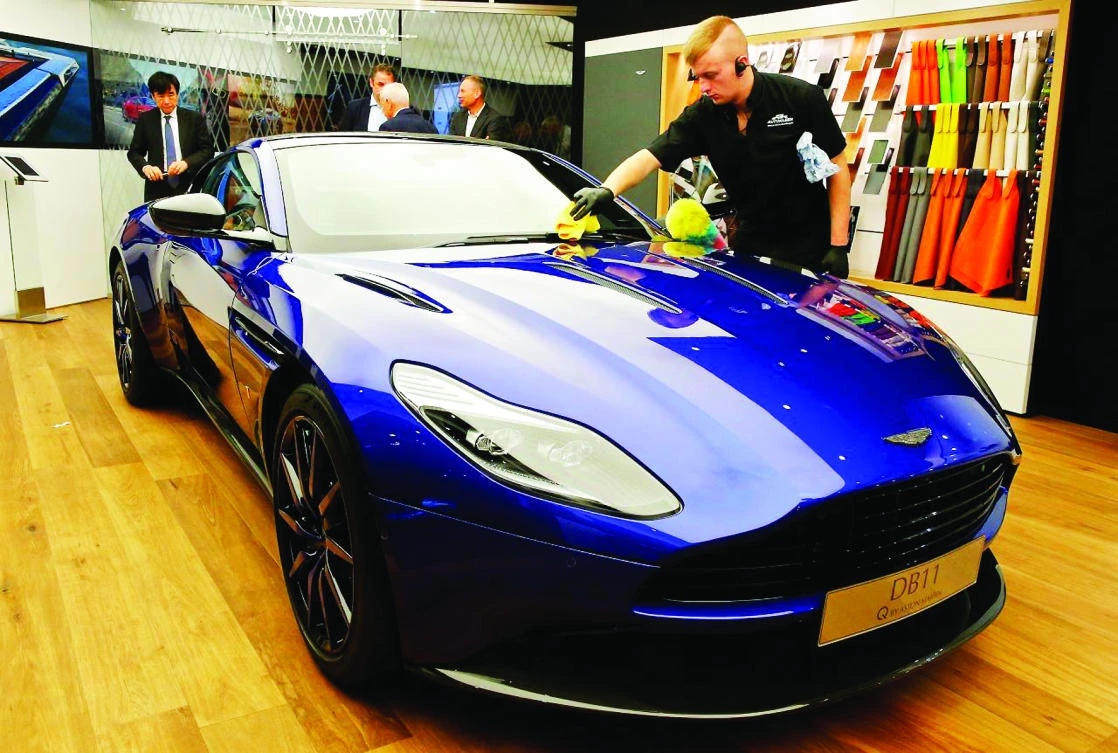 Aston Martin reported its first half-yearly profit in almost a decade on Friday as sales of the new DB11 model put the luxury British carmaker on the road to recovery. (Reuters)